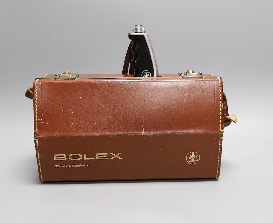 A vintage Bolex zoom reflex cine camera in original leather case